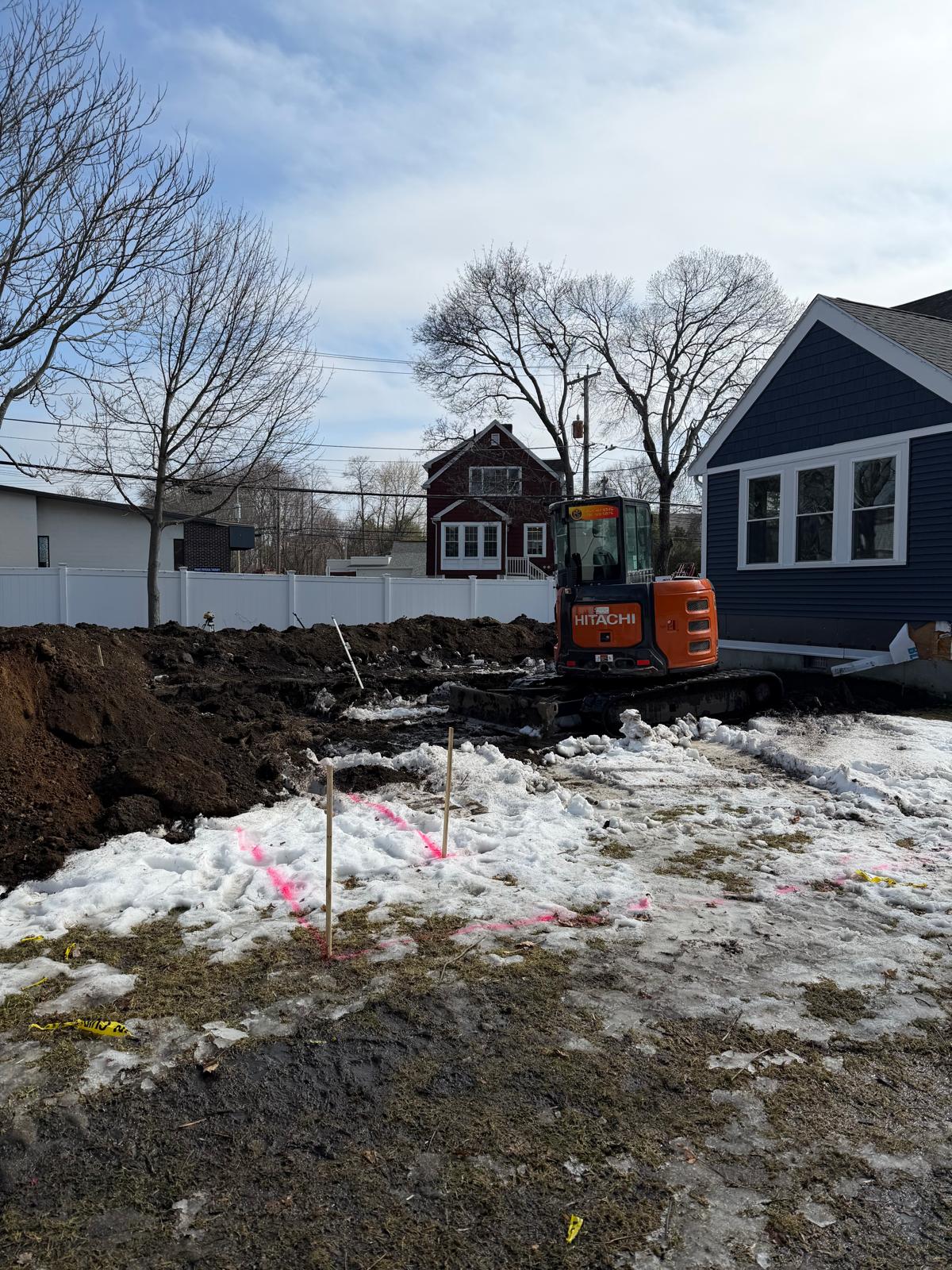 Excavation beside the existing house before the Reading addition foundation