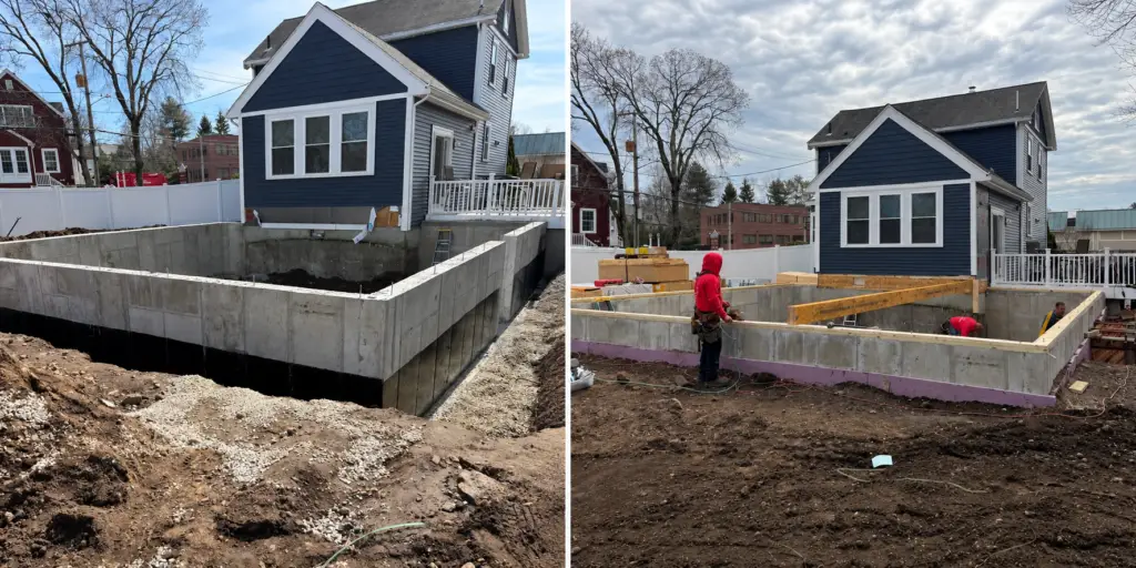 Concrete foundation walls with waterproofing, drainage stone and exterior rigid insulation before backfilling