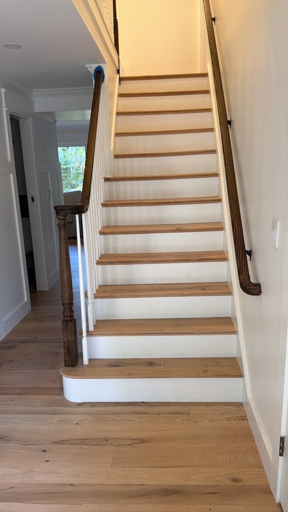 Reclaimed wood stair treads with painted risers in Hudson MA